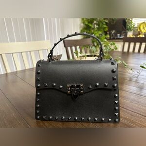 New black crossbody bag by J